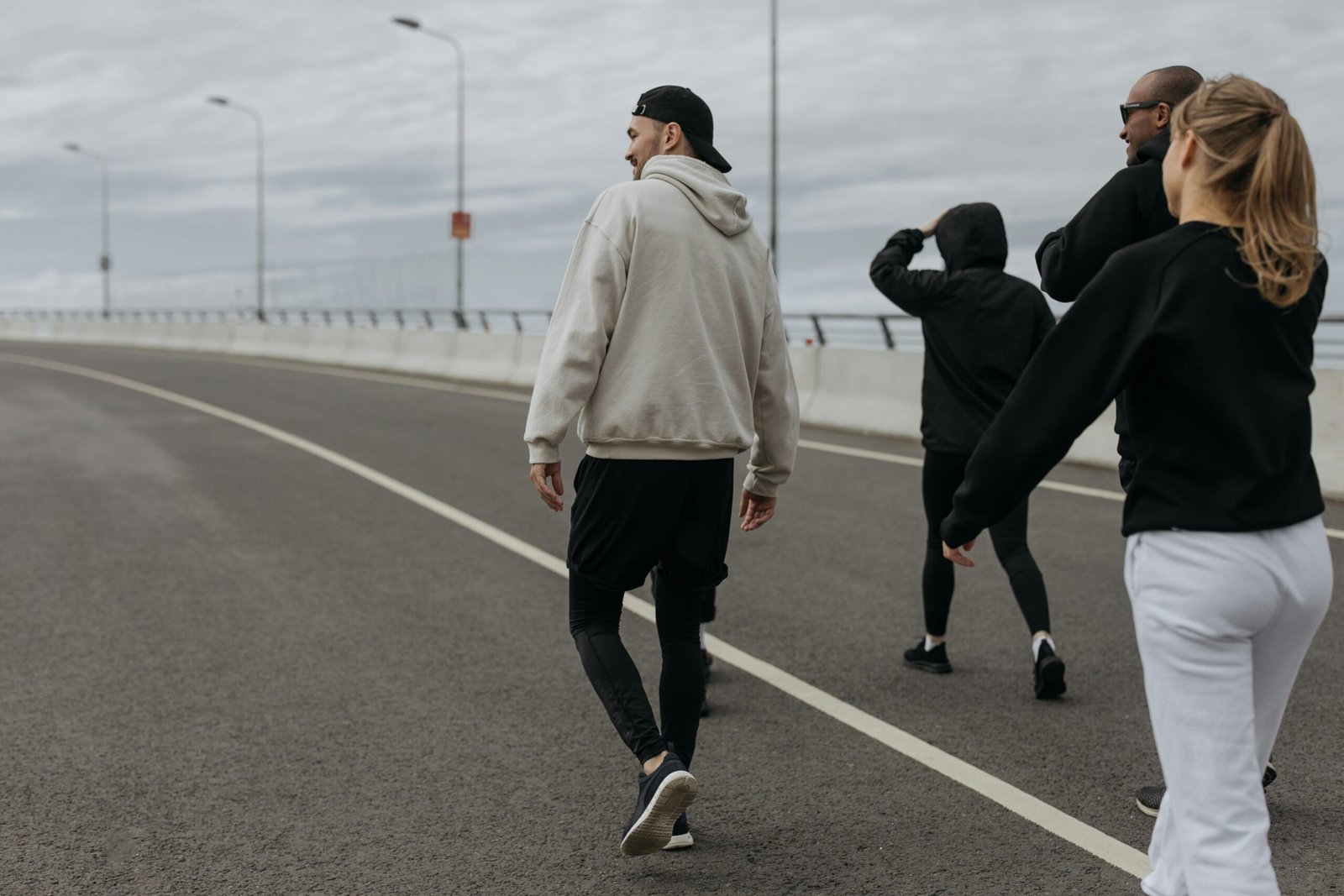 People walking on a street trail.